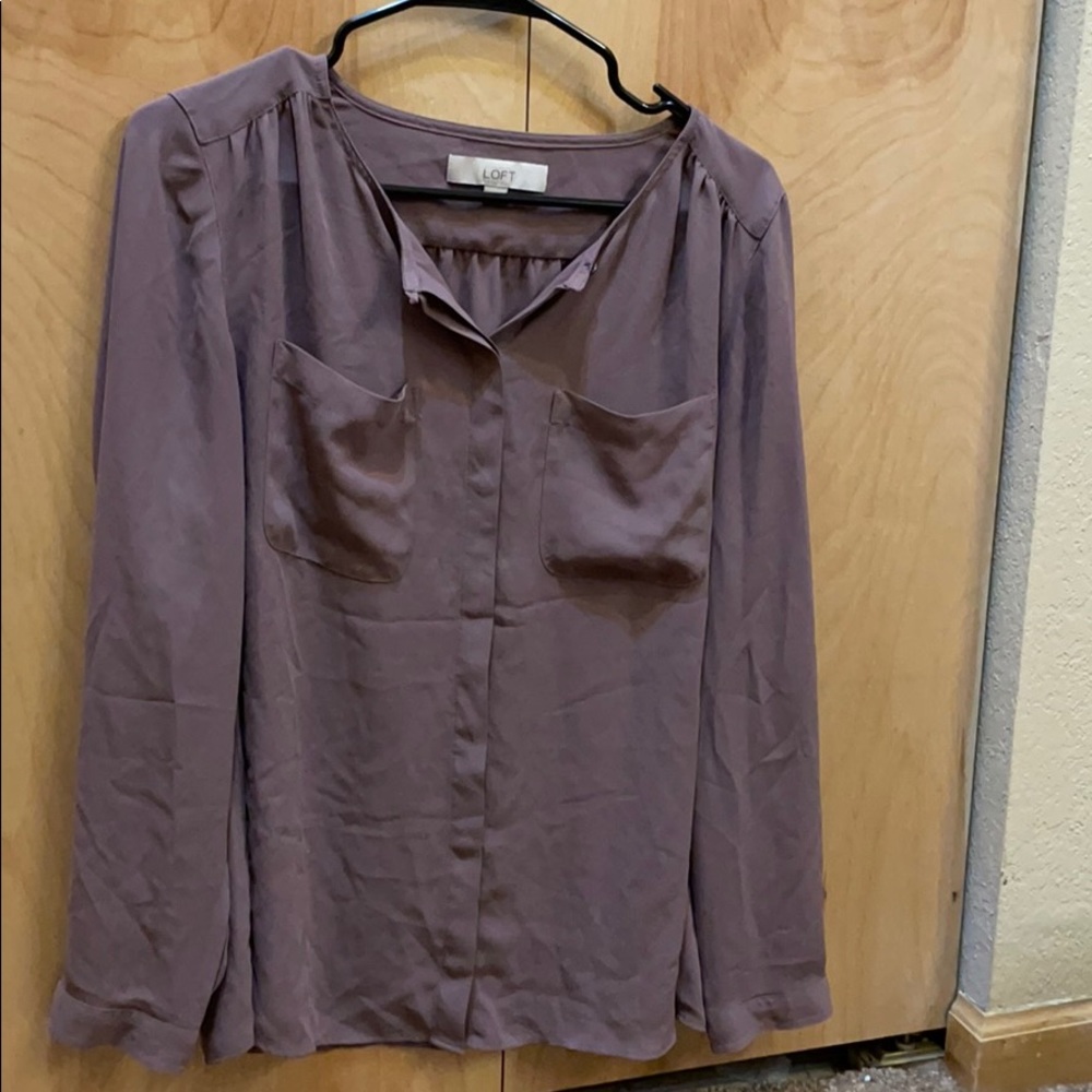 Mauve/purple blouse.